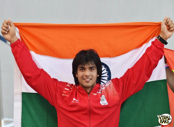 neeraj chopra with flag