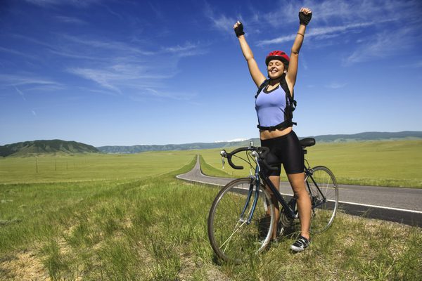 woman happy cycling