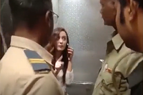 girl strips in front of cops
