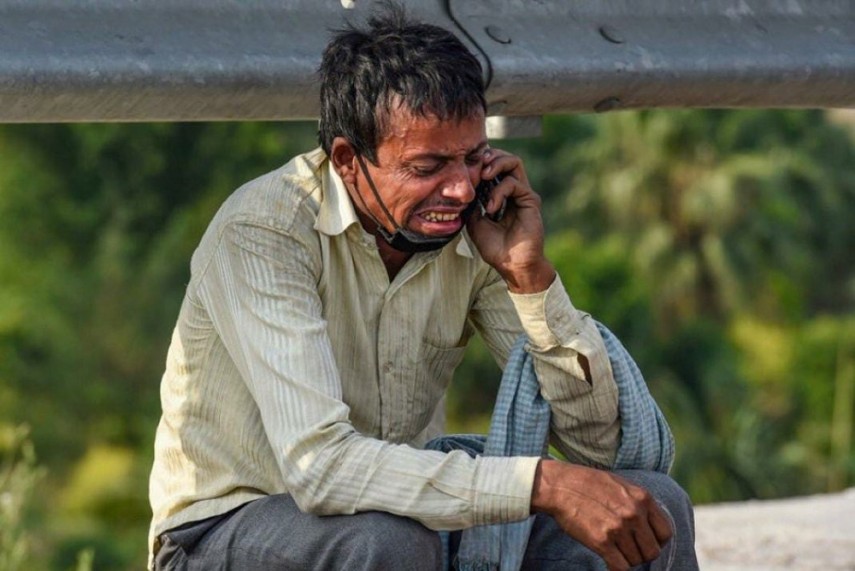 man crying on phone