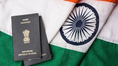 indian passport and authentic indian tricolour flag made up of khadi or pure cotton material